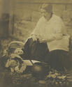 Woman peeling vegetables